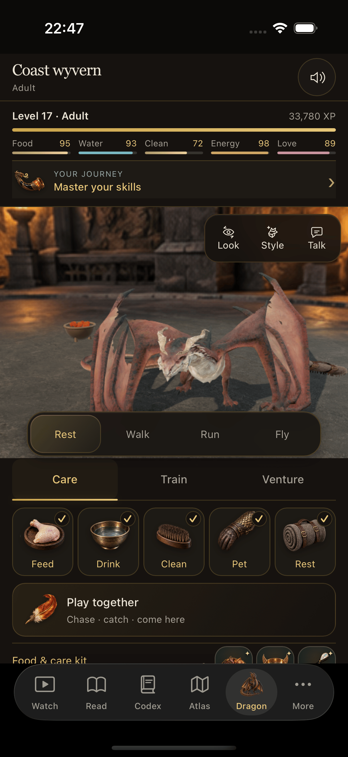 Dragonbond on iOS showing an adult dragon and its care activities